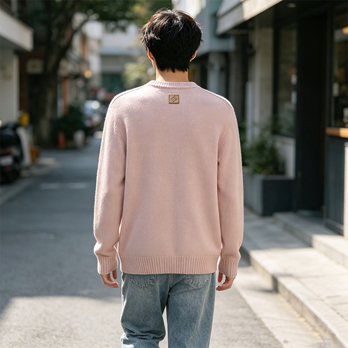 lv louis vuitton solid crew‑neck sweater with leather patch